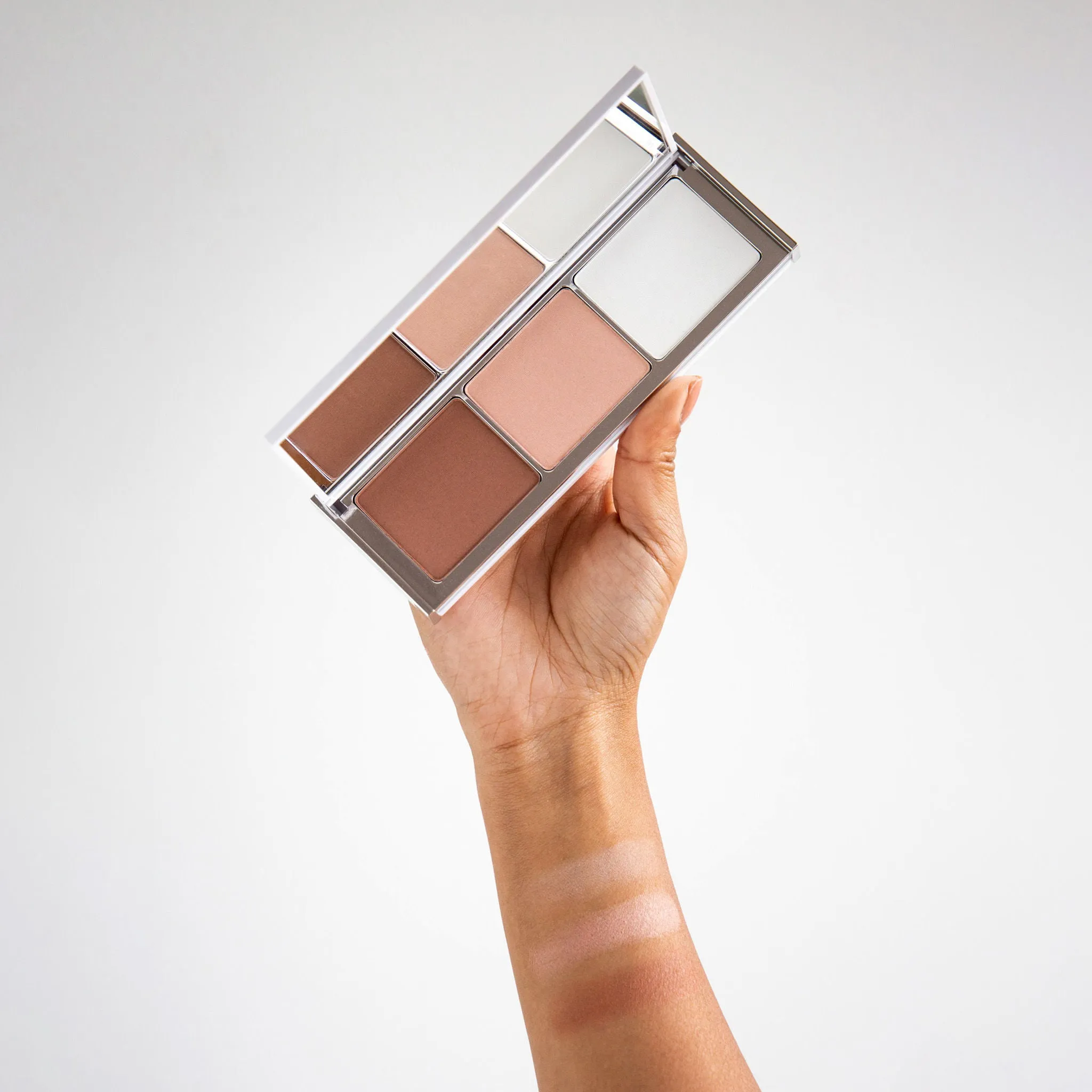 Daybreak Bronzer. Illuminator and Setting Powder Palette