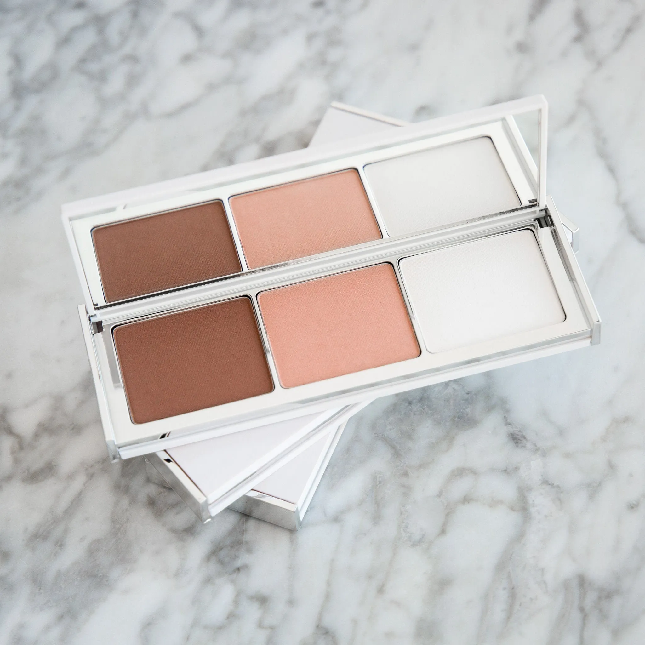 Daybreak Bronzer. Illuminator and Setting Powder Palette